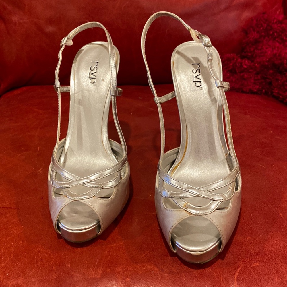 Silver peep toes with a sling back
